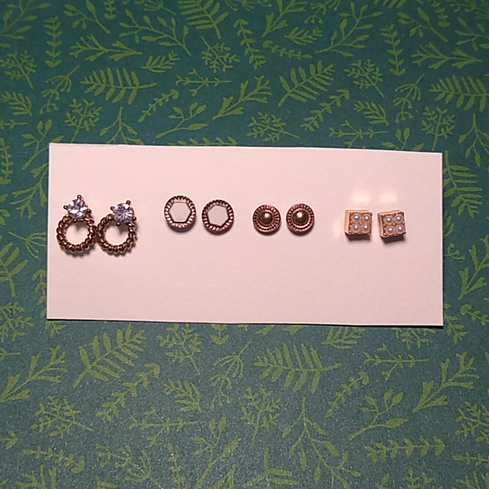 Gold stud earrings